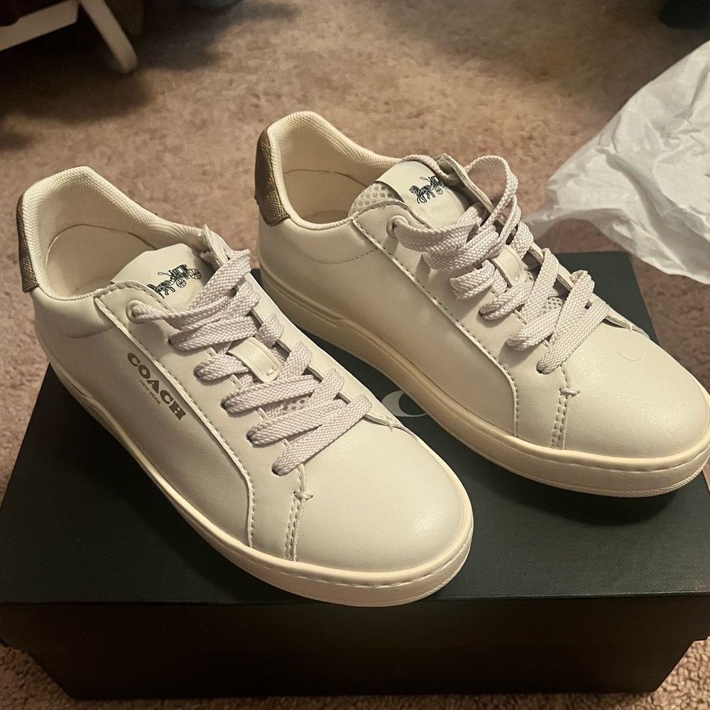 NWT Coach leather low top sneakers.